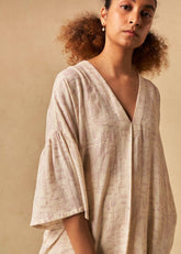 A Model Wearing Beige Organic Cotton The Holiday handwoven kaftan, curated by Only Ethikal